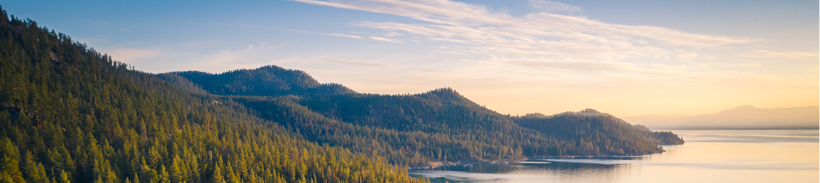 Aerial View of Lake Tahoe Mountains and Turquoise Blue Water, California, USA