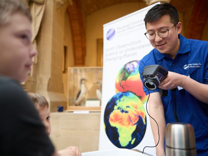 Scientist demonstrating a thermal camera